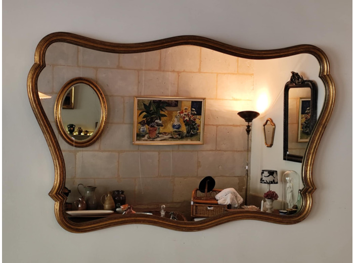 Grand miroir en bois doré à accrocher à l'horizontale