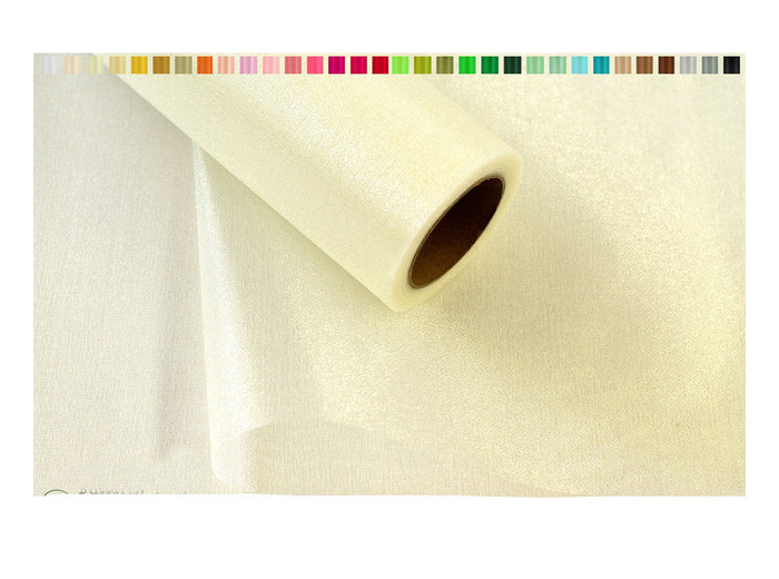 Tissus organza 16 cm de large 9 metres de long colori creme